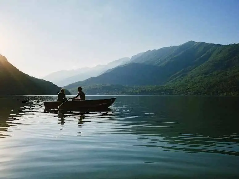 Boat on a calm mountain lake
